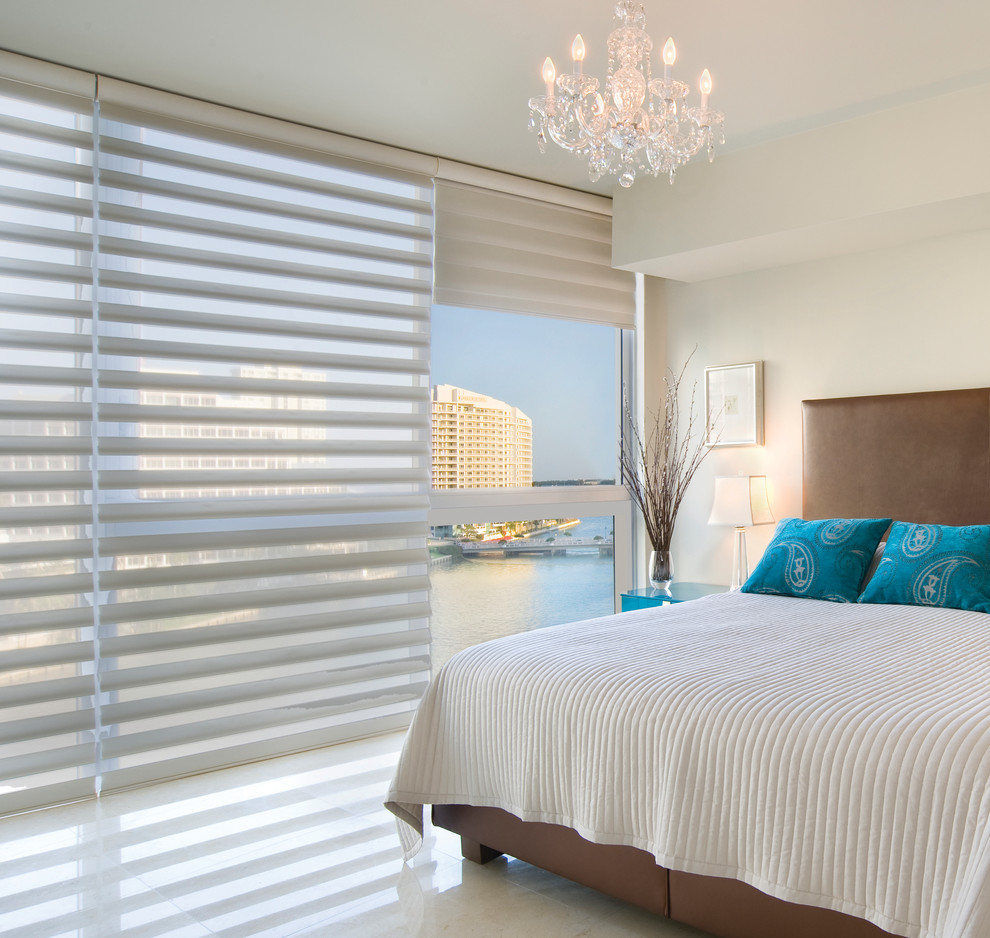 Mid-sized transitional master porcelain tile and beige floor bedroom photo in Phoenix with white walls