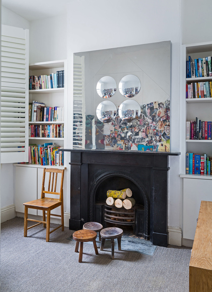 Photo of an eclectic home office in Melbourne with grey walls, carpet and a standard fireplace.