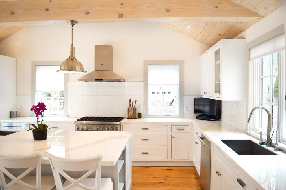 Example of a transitional kitchen design in New York