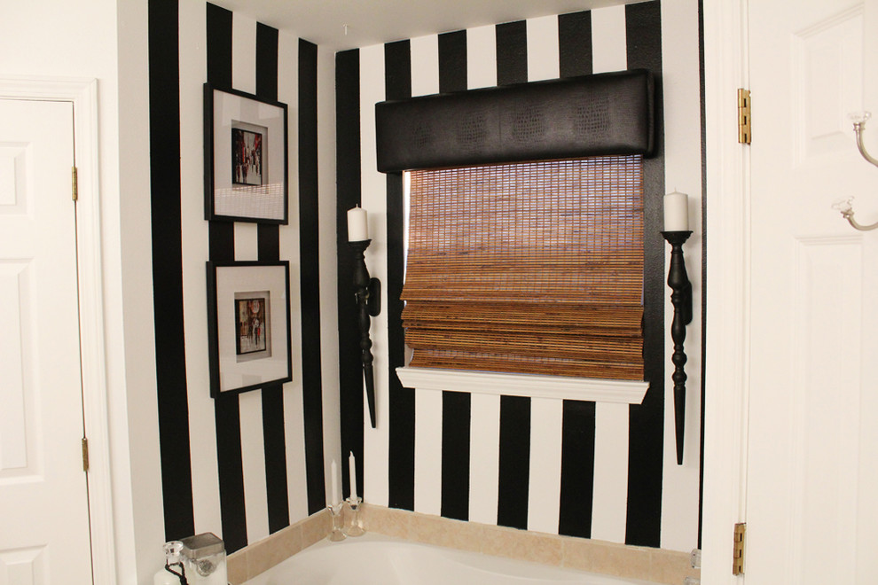 Design ideas for a mid-sized eclectic bathroom in New Orleans with black cabinets and white walls.