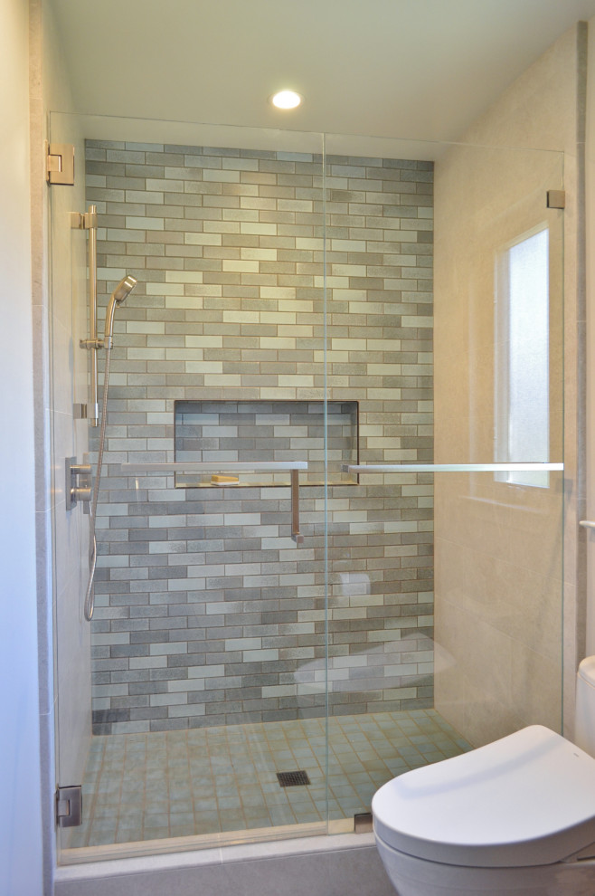 Design ideas for a medium sized traditional shower room bathroom in San Francisco with recessed-panel cabinets, medium wood cabinets, an alcove shower, blue tiles, porcelain tiles, porcelain flooring, a submerged sink, granite worktops, grey floors, a hinged door, multi-coloured worktops, a single sink and a built in vanity unit.