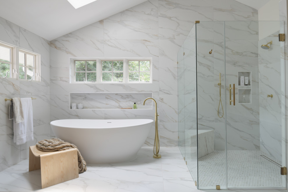 Huge minimalist master white tile and porcelain tile porcelain tile, white floor, double-sink, vaulted ceiling and wall paneling bathroom photo in DC Metro with flat-panel cabinets, medium tone wood cabinets, a bidet, white walls, an undermount sink, marble countertops, a hinged shower door, white countertops and a floating vanity