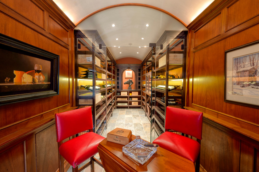 Large elegant slate floor wine cellar photo in Philadelphia