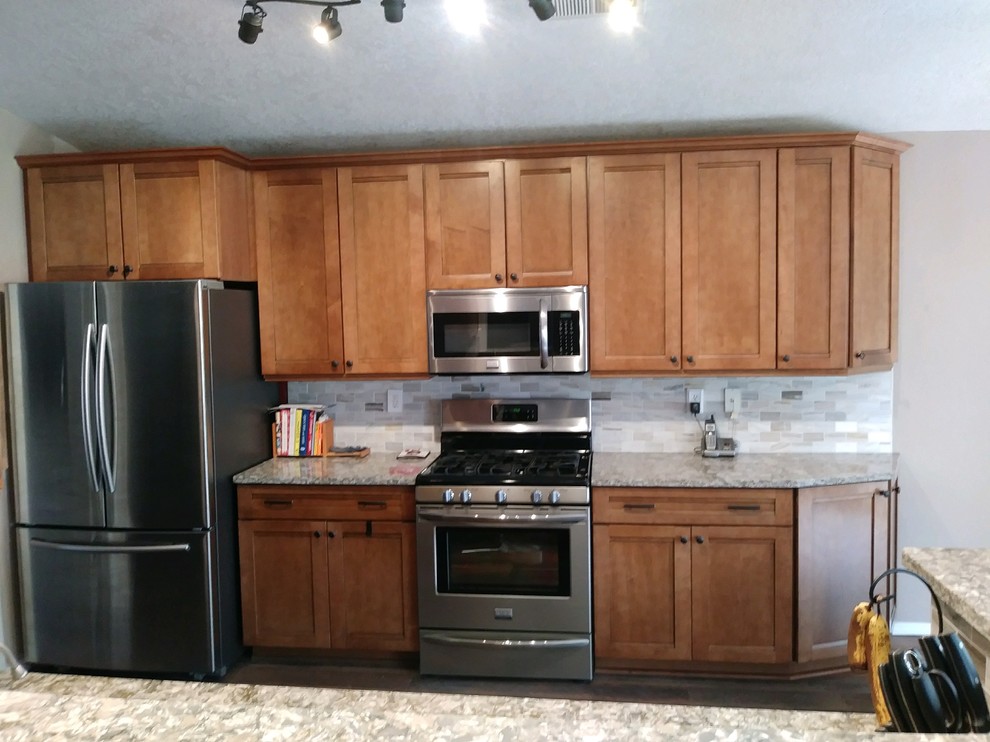 Example of a transitional kitchen design in Albuquerque