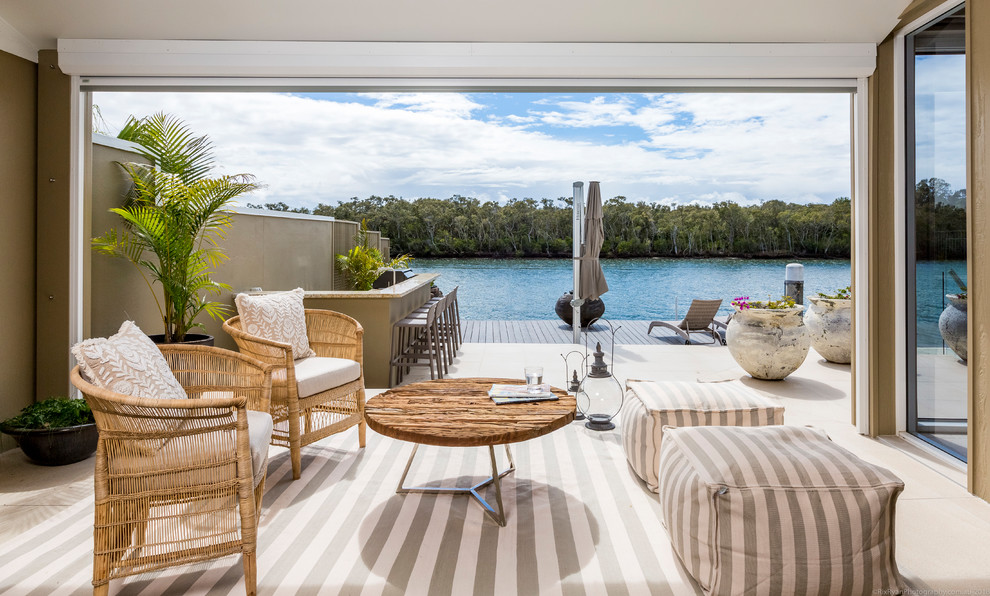 This is an example of a beach style patio in Gold Coast - Tweed.
