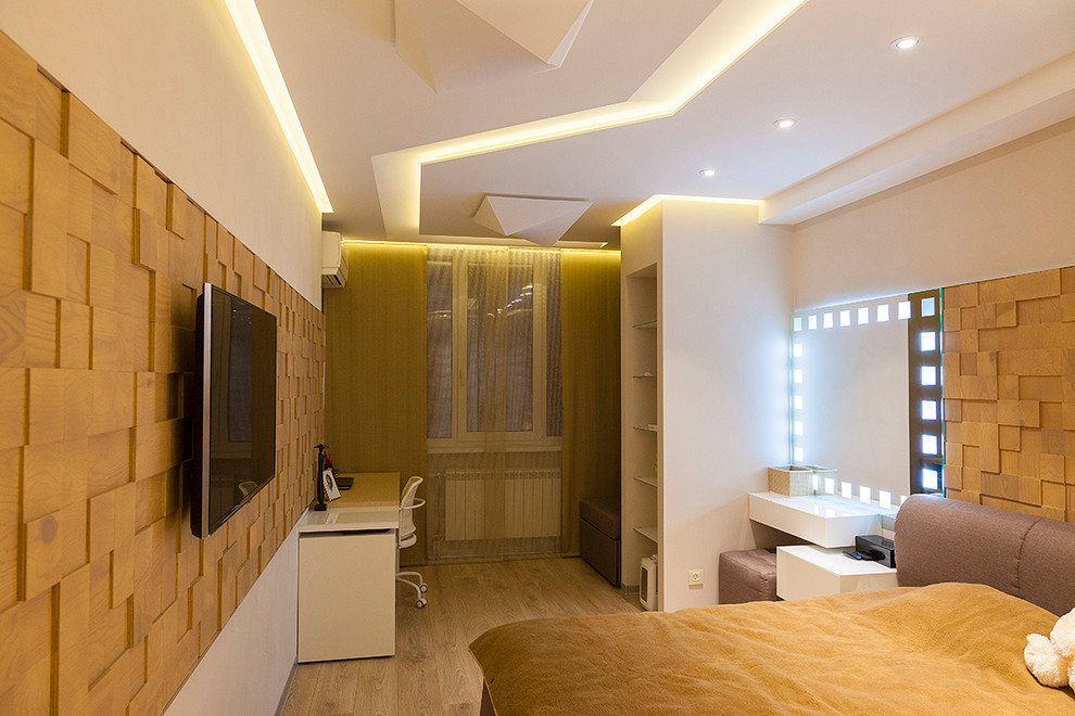 Design ideas for a small contemporary teen room in Other with beige walls, laminate floors and beige floor.