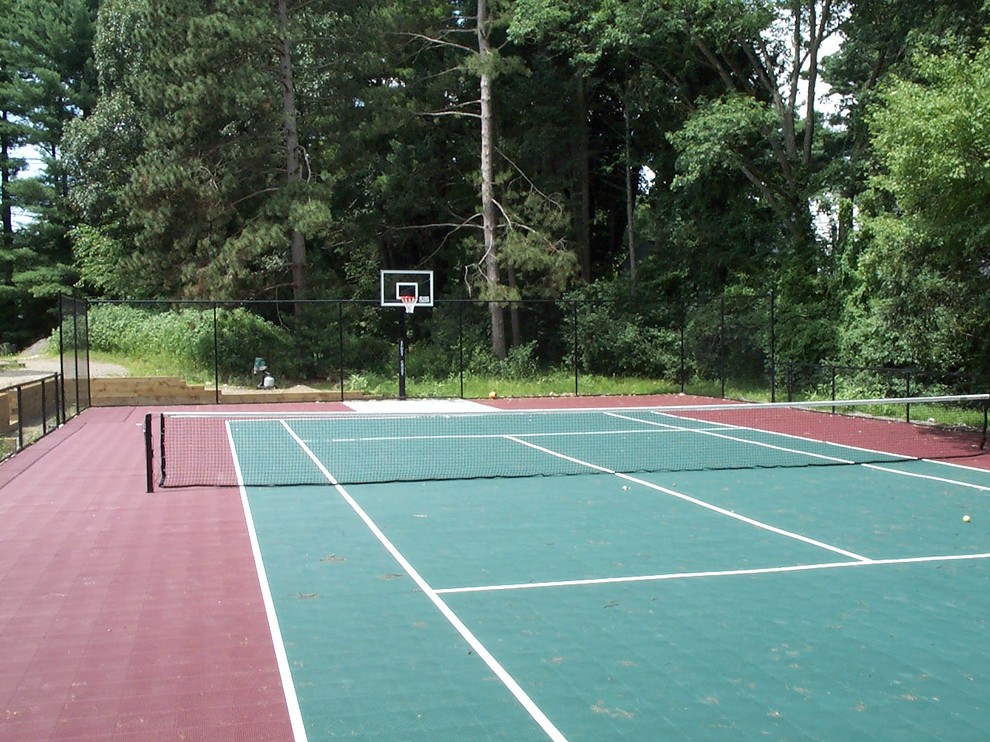 Inspiration for a large traditional backyard partial sun outdoor sport court in Boston with with outdoor playset and concrete pavers.