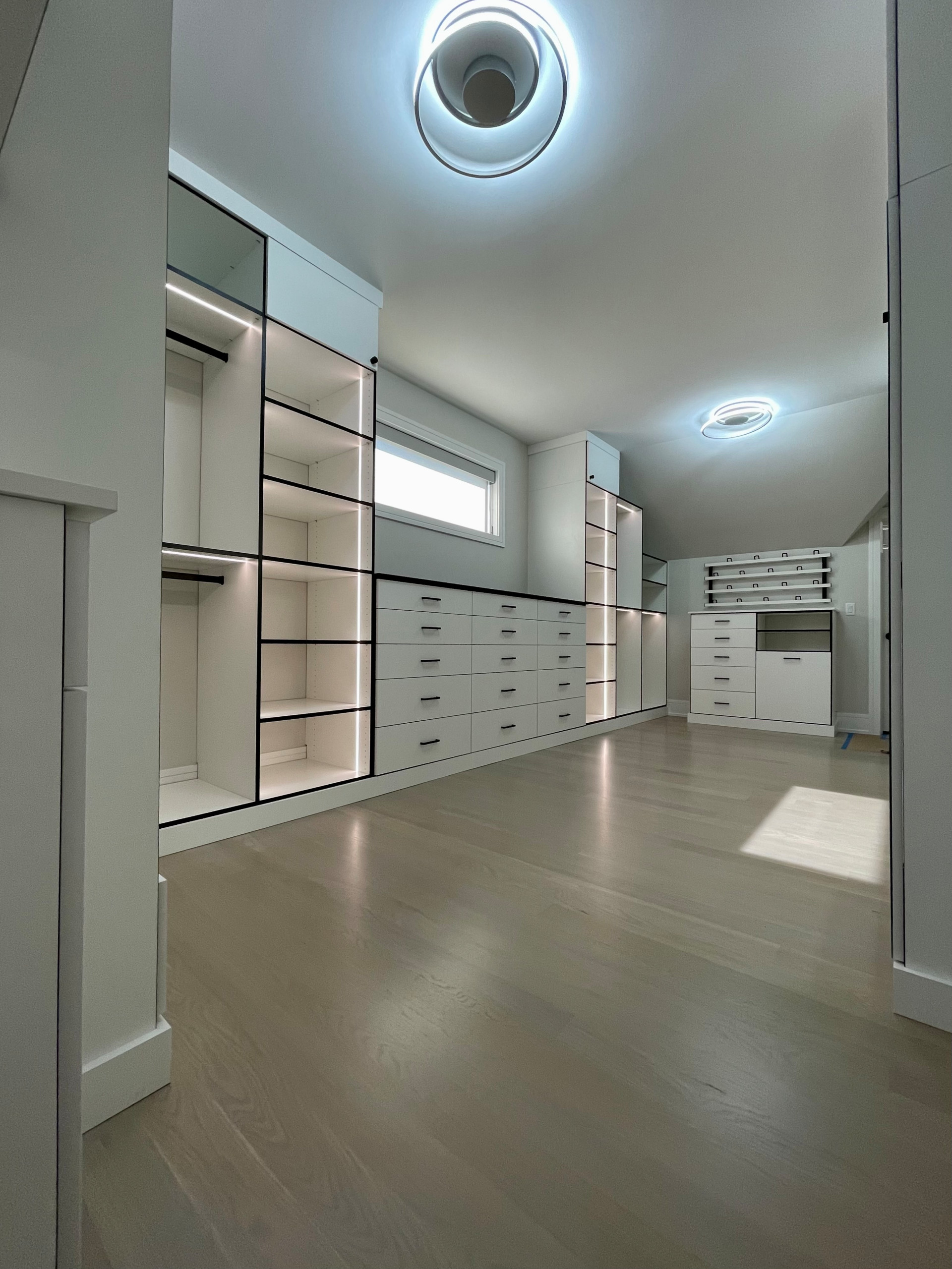 High-end Contemporary White & Black Closet