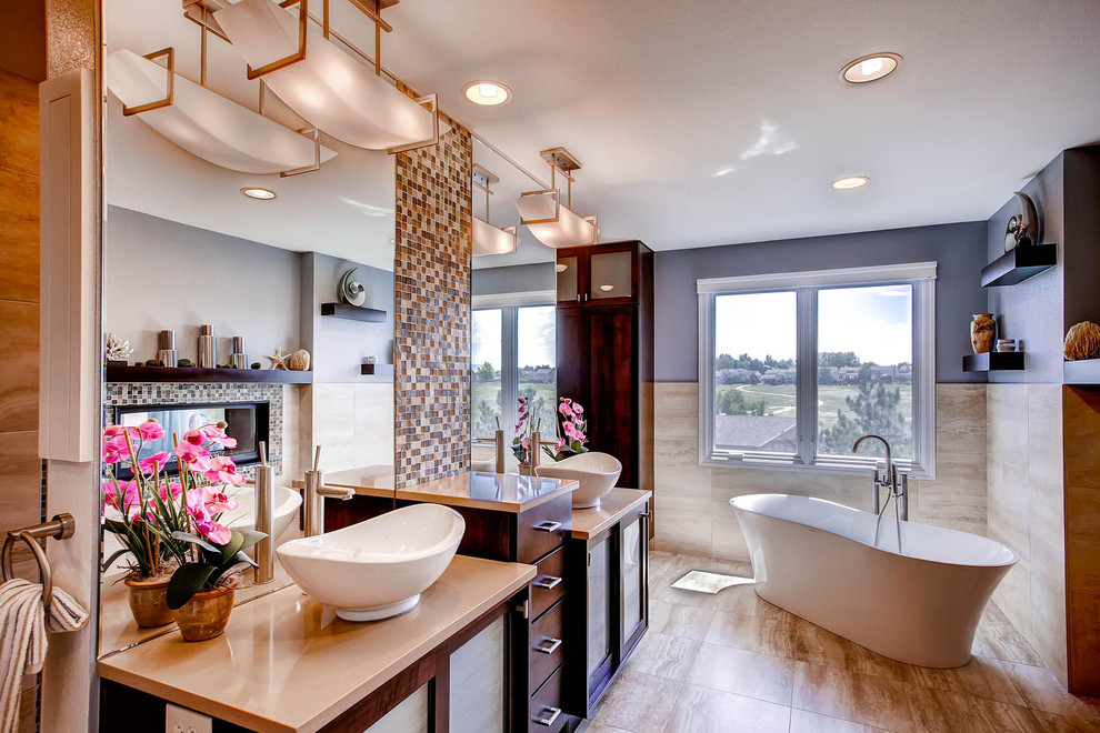 Inspiration for a large contemporary master bathroom in Denver with a vessel sink, shaker cabinets, medium wood cabinets, engineered quartz benchtops, a freestanding tub, an open shower, a two-piece toilet, beige tile, ceramic tile, blue walls and ceramic floors.