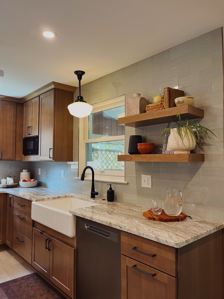 Mid-sized transitional l-shaped vinyl floor and beige floor eat-in kitchen photo with a farmhouse sink, shaker cabinets, medium tone wood cabinets, quartzite countertops, green backsplash, ceramic backsplash, stainless steel appliances, no island and beige countertops