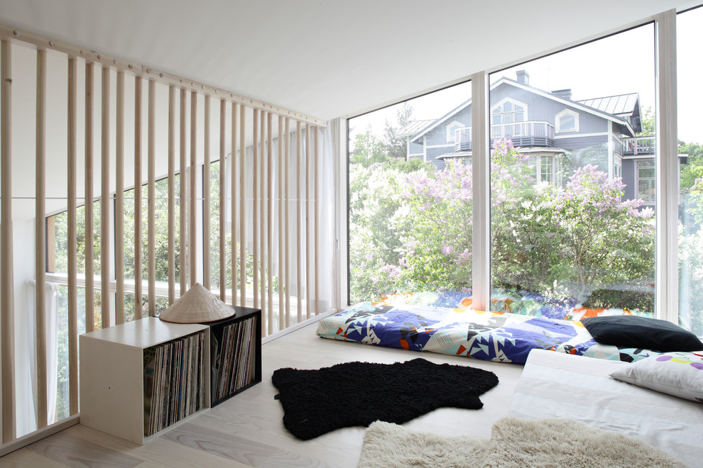 This is an example of a scandinavian sunroom in Other.