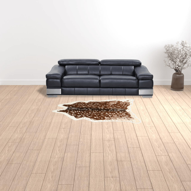 5' X 8' Off White And Brown Faux Cowhide Tufted Washable Non Skid Area