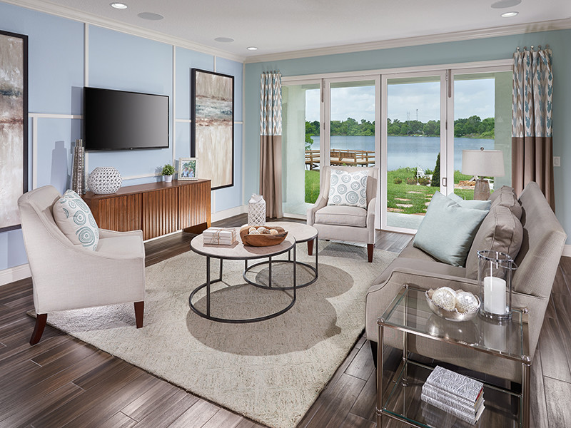 This is an example of a mid-sized transitional living room in Orlando.