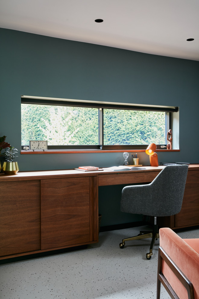 Photo of a large midcentury study room in London with green walls.