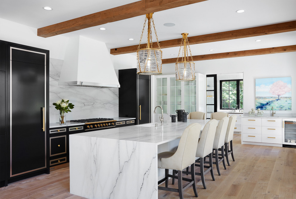 Inspiration for a transitional u-shaped kitchen in Minneapolis with an undermount sink, flat-panel cabinets, white cabinets, marble benchtops, multi-coloured splashback, marble splashback, panelled appliances, medium hardwood floors, with island, brown floor, multi-coloured benchtop and exposed beam.