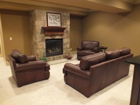 Large traditional open concept family room in Cleveland with brown walls, carpet, a standard fireplace, a stone fireplace surround and no tv.