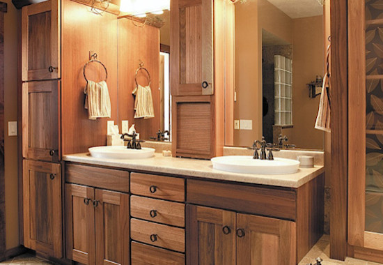 Inspiration for a mid-sized arts and crafts master bathroom in Detroit with recessed-panel cabinets, medium wood cabinets, granite benchtops, an open shower, beige tile and beige walls.