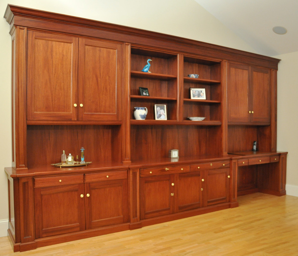 Photo of a large traditional home office in Boston with a built-in desk.