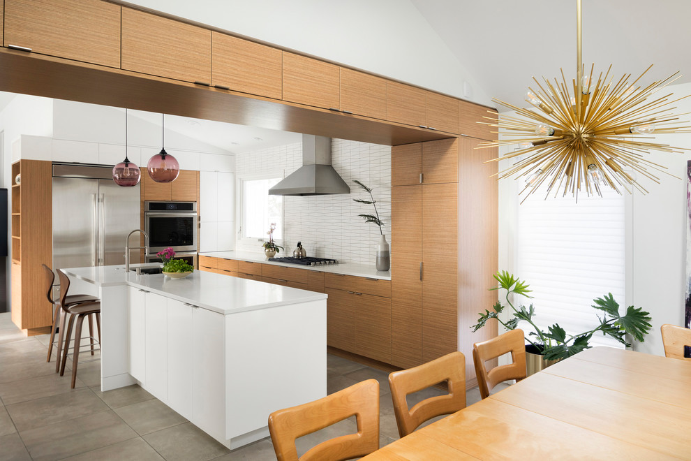 Midcentury kitchen in Minneapolis with flat-panel cabinets.