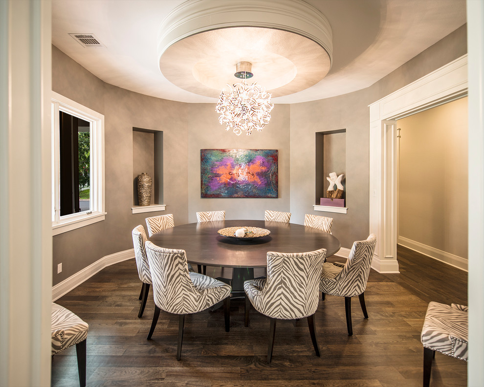 Example of a trendy dining room design in Austin with gray walls