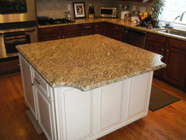 new venetian gold granite with white cabinets - traditional