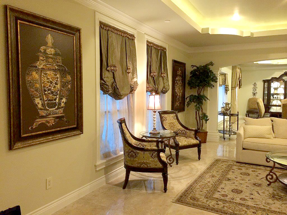 Large elegant formal and open concept marble floor living room photo in Houston with beige walls and no tv