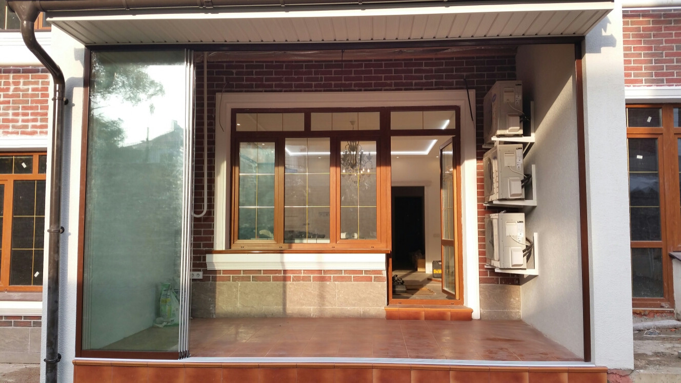 Раздвижное безрамное остекление террасы SF20  от SUNFLEX Германия