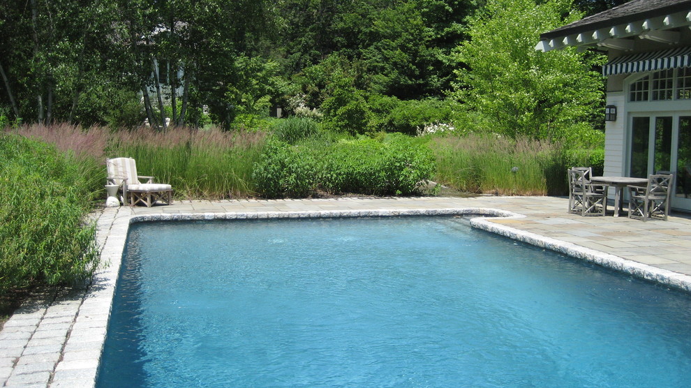 This is an example of an expansive country backyard pool in New York.