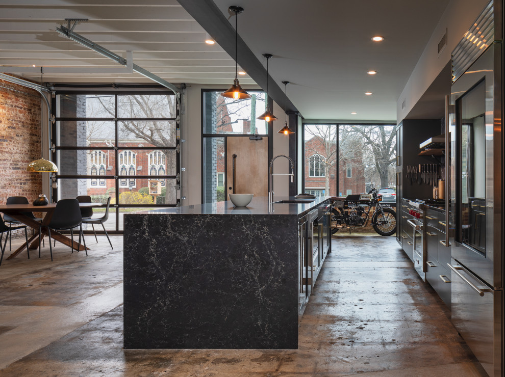 Inspiration for an industrial kitchen in Raleigh.