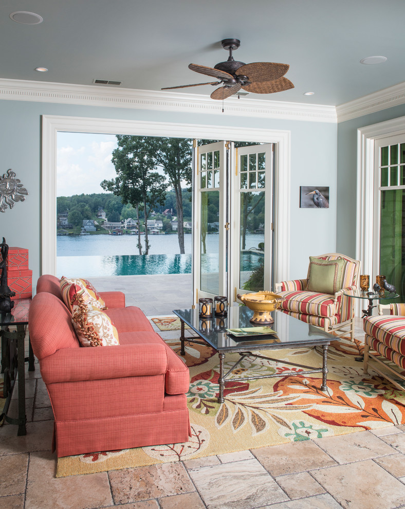 Inspiration for a tropical sunroom in Columbus with limestone floors and a standard ceiling.