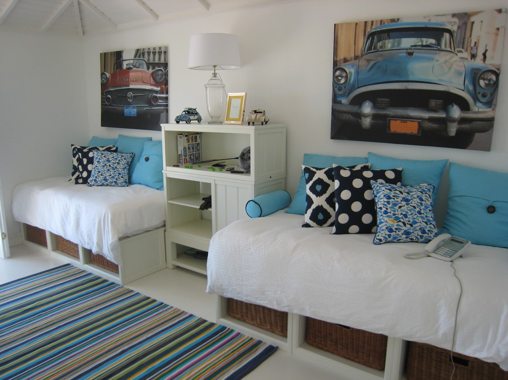 Inspiration for a tropical guest bedroom in Other with white walls.