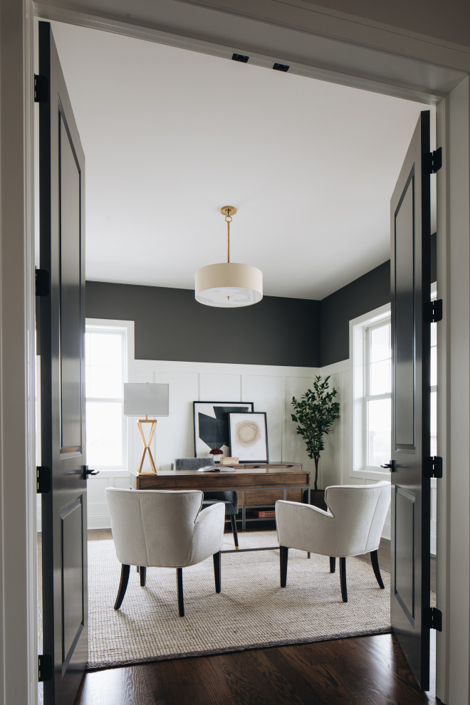 Design ideas for a transitional home office in Chicago with grey walls, dark hardwood floors, a freestanding desk, brown floor and decorative wall panelling.