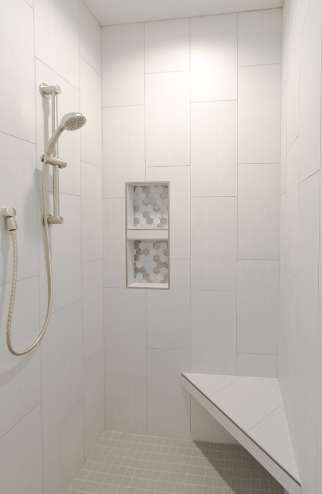 Transitional bathroom in Other with white tile, white walls, mosaic tile floors, grey floor and a shower seat.