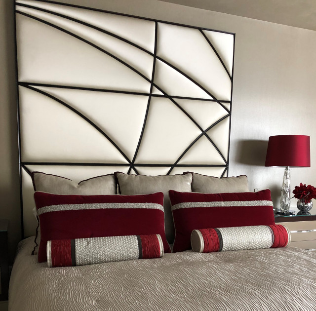 Drama and Rich Red Accents in Master Bedroom contemporary-sovrum