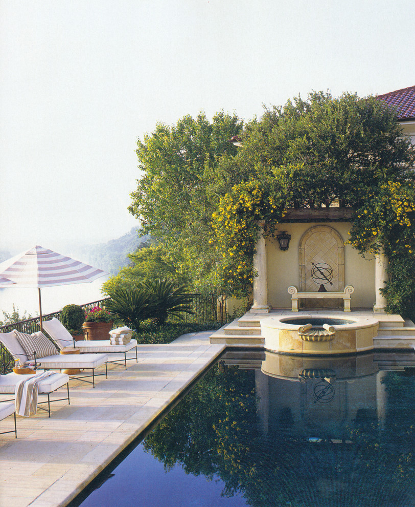 This is an example of a mediterranean rectangular pool in Austin.