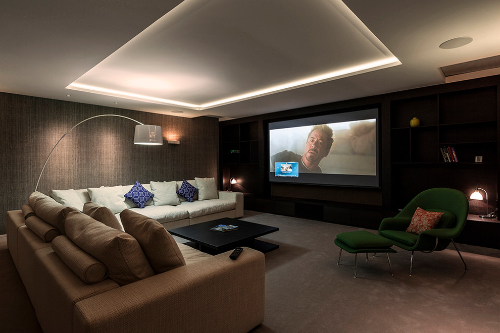 Photo of a contemporary home theatre in Surrey.