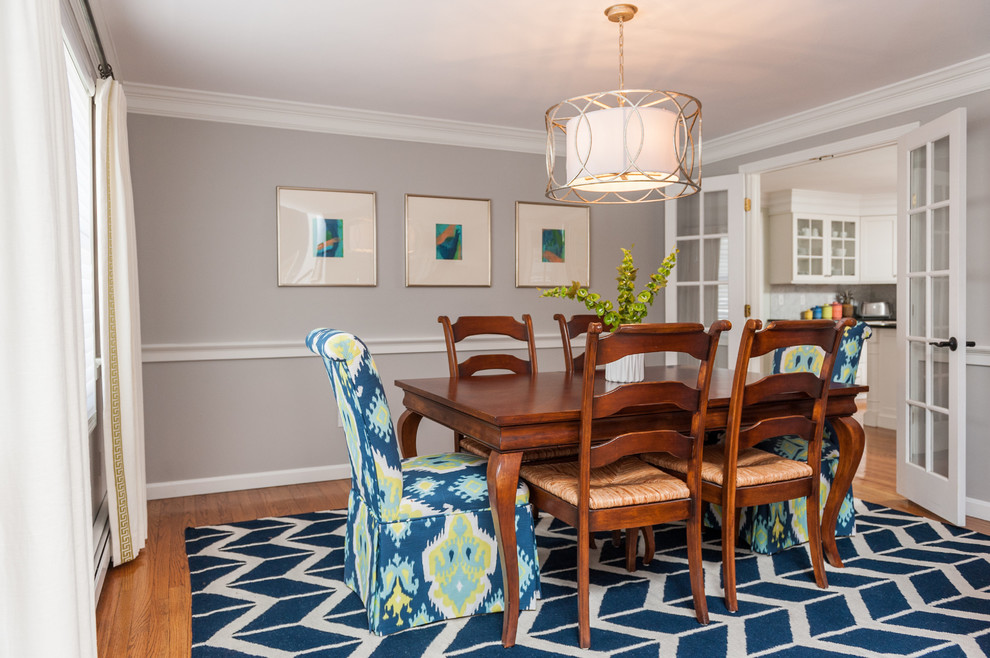 Inspiration for a modern dining room remodel in Boston with gray walls