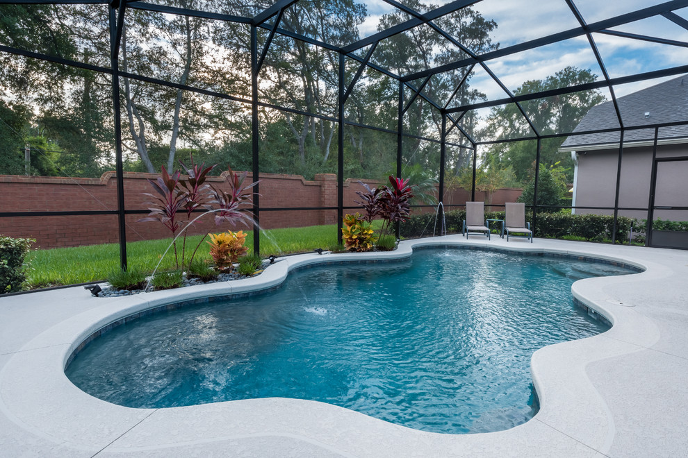 Mid-sized transitional indoor custom-shaped pool fountain photo in Orlando