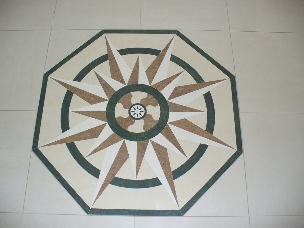 Inspiration for a ceramic tile entryway remodel in Denver