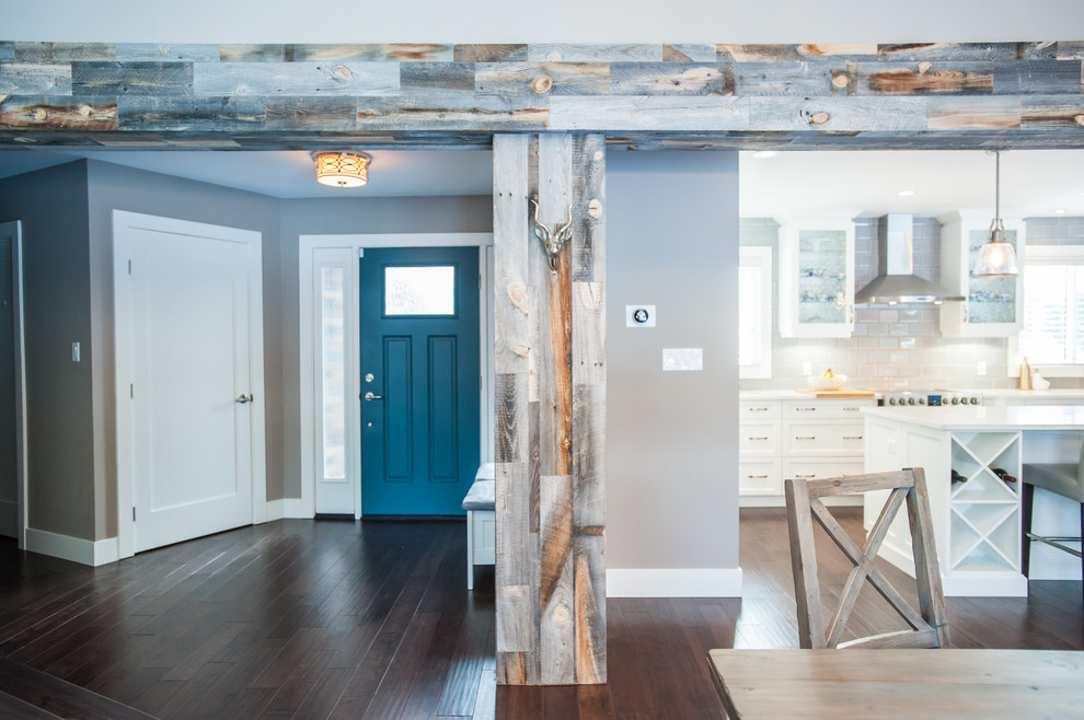 Mountain style entryway photo in Edmonton