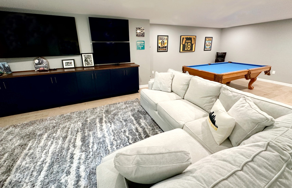 Basement - transitional vinyl floor basement idea