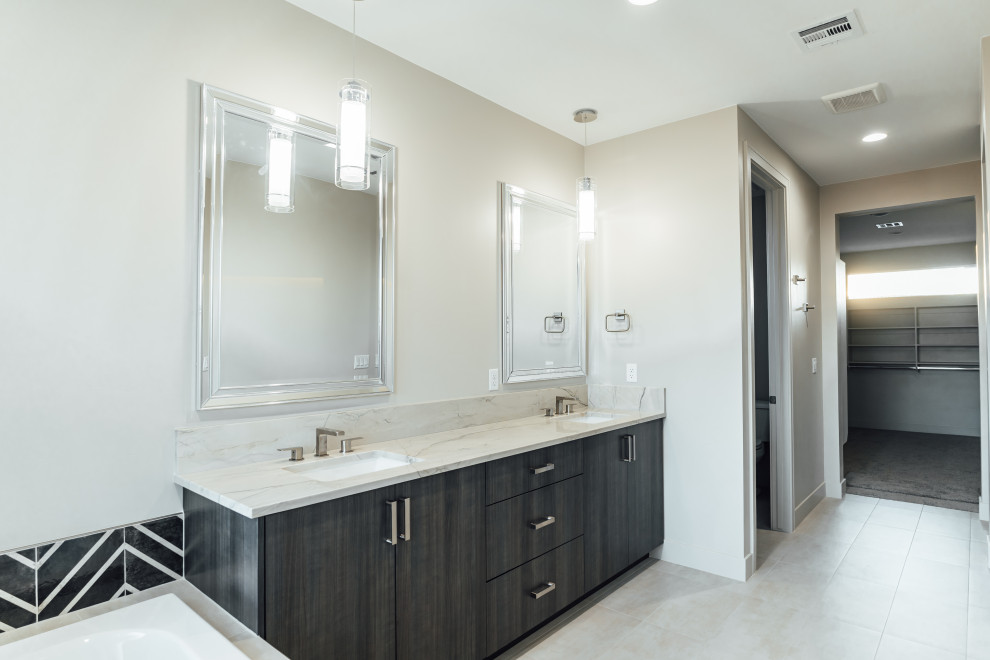 Photo of a modern ensuite bathroom in Salt Lake City with flat-panel cabinets, brown cabinets, a corner bath, a corner shower, a two-piece toilet, beige tiles, mirror tiles, beige walls, ceramic flooring, a submerged sink, quartz worktops, beige floors, an open shower, white worktops, a shower bench, double sinks and a built in vanity unit.