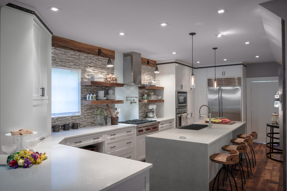 This is an example of a large contemporary l-shaped separate kitchen in Nashville with a farmhouse sink, open cabinets, white cabinets, quartz benchtops, multi-coloured splashback, matchstick tile splashback, stainless steel appliances, dark hardwood floors, with island and brown floor.