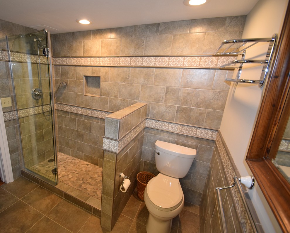 Example of a small transitional master multicolored tile and ceramic tile ceramic tile doorless shower design with raised-panel cabinets, white cabinets, a two-piece toilet, gray walls, a vessel sink and quartz countertops