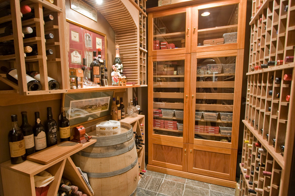 Inspiration for a mediterranean wine cellar in Little Rock.