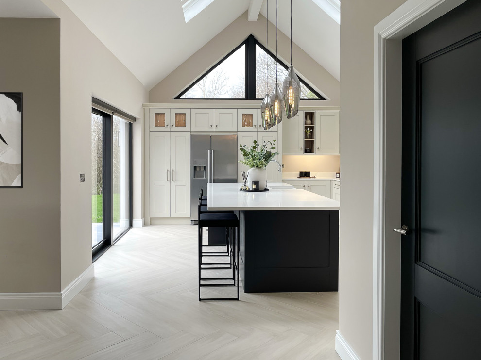Design ideas for a classic cream and black kitchen in Other.