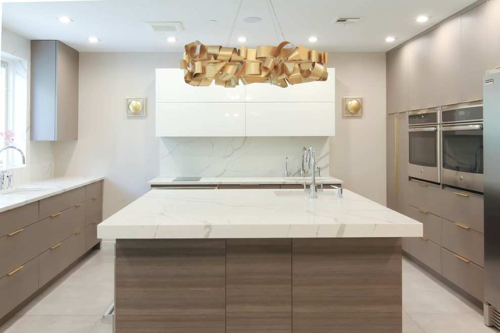 Large contemporary u-shaped eat-in kitchen in New York with an undermount sink, flat-panel cabinets, brown cabinets, quartzite benchtops, white splashback, stone slab splashback, stainless steel appliances, ceramic floors, with island, grey floor and yellow benchtop.