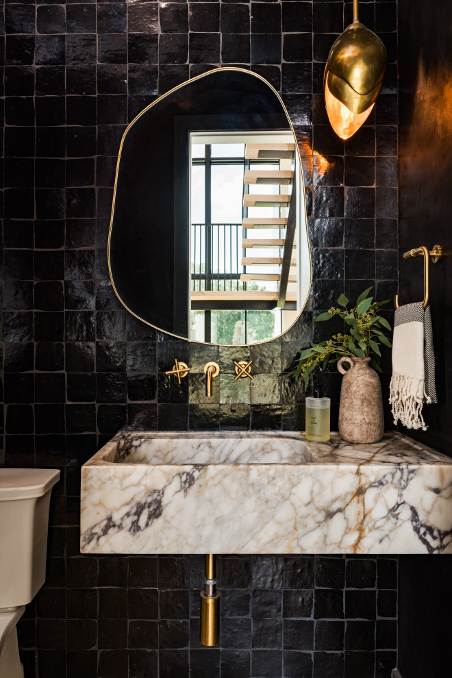 Example of a transitional powder room design in Tampa
