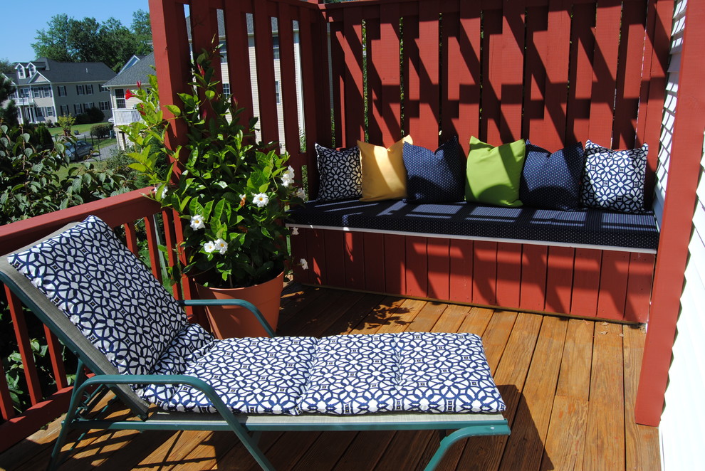 Photo of a mid-sized traditional backyard deck in Boston.