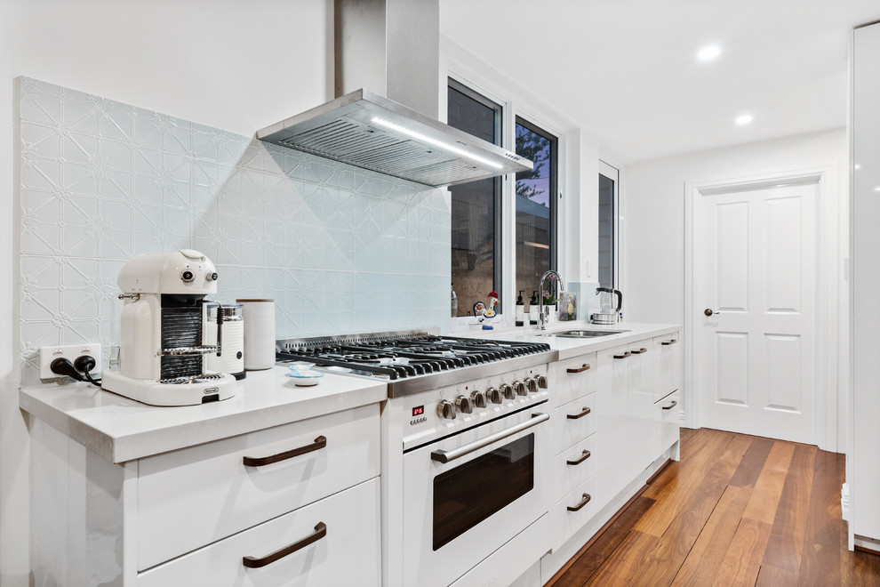 Inspiration for a large transitional galley open plan kitchen in Perth.